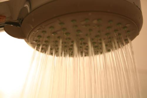 a shower head is hanging from the ceiling at Hotel Sirius in Huy