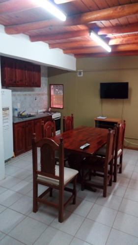 Televisyen dan/atau pusat hiburan di Apart Tierra Sureña
