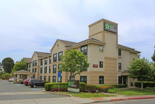 a hotel building with a sign on top of it at Extended Stay America Suites - Richmond - Hilltop Mall in Richmond