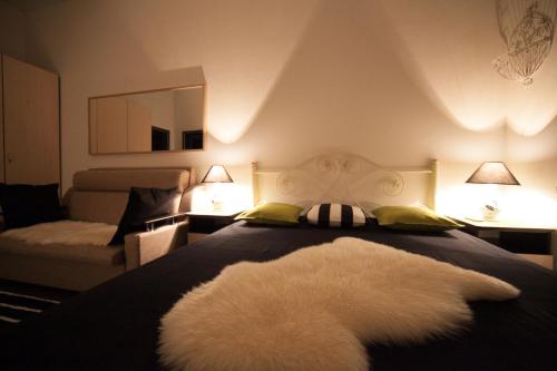 Кровать или кровати в номере Apartment Chernomorskaya 10 Lux