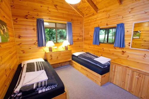 Postel nebo postele na pokoji v ubytování Mt Glorious Getaways