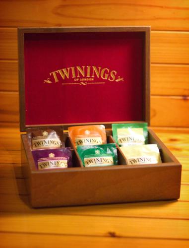a wooden box filled with different types of cheese at Mt Glorious Getaways in Mount Glorious
