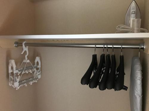 a shelf with a bunch of cooking utensils on it at Naganoya in Kyoto