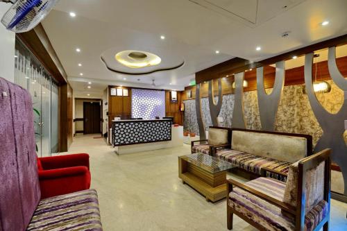 Predel za sedenje v nastanitvi Hotel Emerald