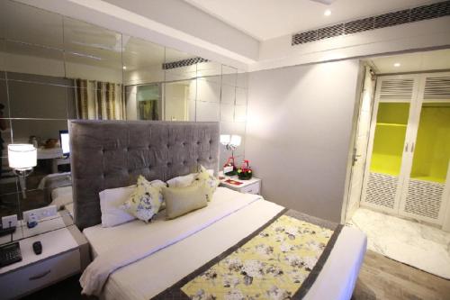 Postelja oz. postelje v sobi nastanitve Hotel Emerald
