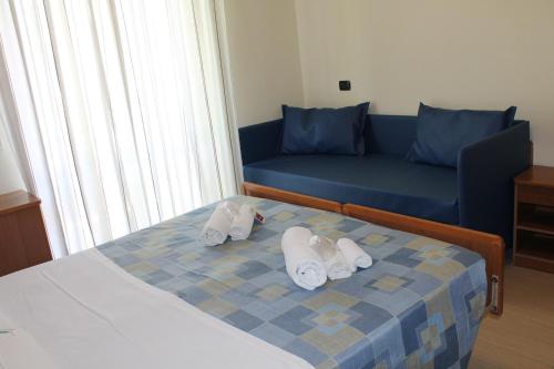 Tempat tidur dalam kamar di Hotel Oblio