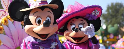 two disney characters dressed up in costumes at a parade at Gîtelabaronnaise avec piscine chauffée prés parc Asterix in Baron
