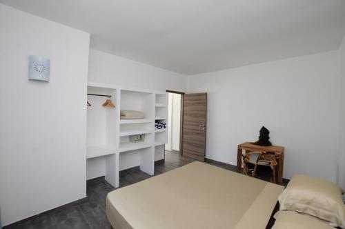 Ένα ή περισσότερα κρεβάτια σε δωμάτιο στο Amani Home - Mbili Junior Suite