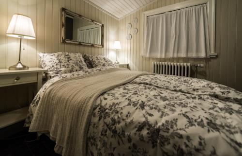 Säng eller sängar i ett rum på Sea Side Cottages