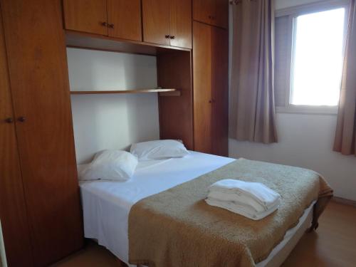 Katil atau katil-katil dalam bilik di Residencial Genéve