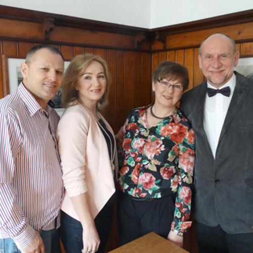 a group of three people posing for a picture at Hotel Sonne - Haus 2 in Idstein