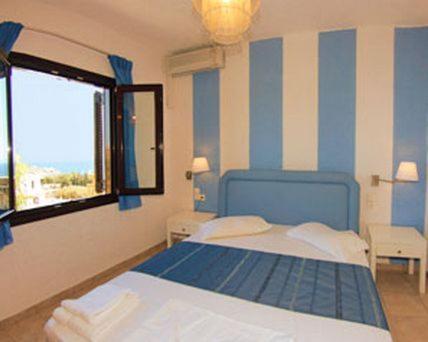 Posteľ alebo postele v izbe v ubytovaní Perla Apartments