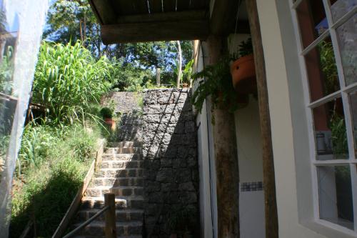 a set of stairs leading up to a house at Villa Girassol in Ilhabela