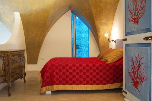 Postel nebo postele na pokoji v ubytování Palazzo Salapolis - Luxury Apartments