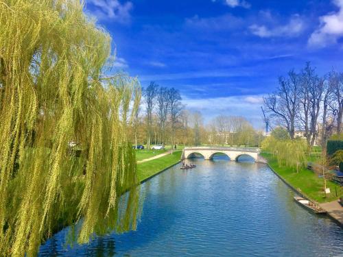 a bridge over a river in a park at Angel's (station accommodation) in Cambridge