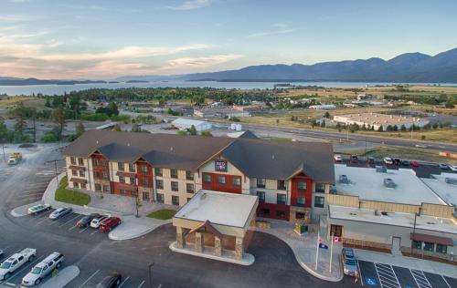 an aerial view of a building with a parking lot at Red Lion Ridgewater Inn & Suites Polson in Polson