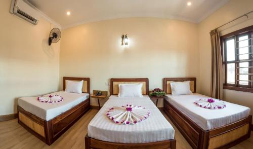 Cama o camas de una habitación en Seng Hout Hotel