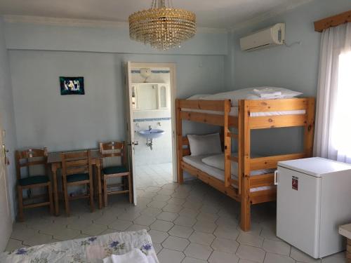 A bed or beds in a room at Villa Elena
