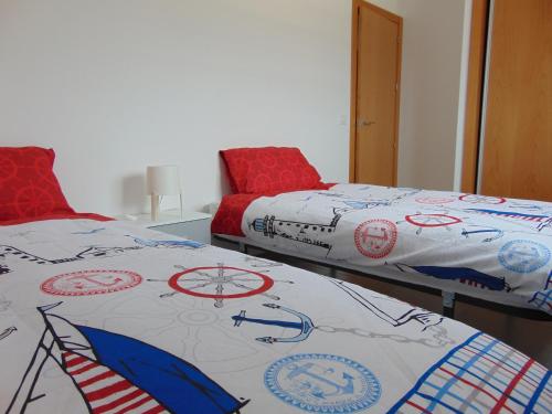 two beds sitting next to each other in a room at Hydra Ground 1D in Puerto de Mazarrón