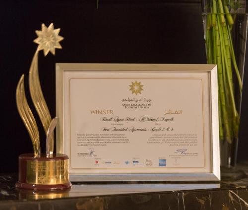 a picture of a certificate in a picture frame at Boudl Al Woroud بودل الورود in Riyadh