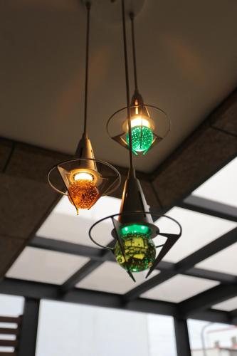 a group of lights hanging from a ceiling at Aria 2 Home (With Elevator) in Hualien City