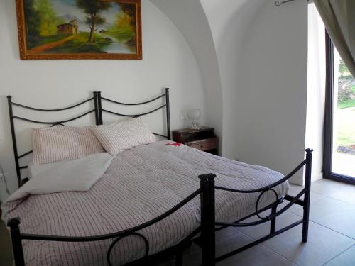 Кровать или кровати в номере Villa Carlotta