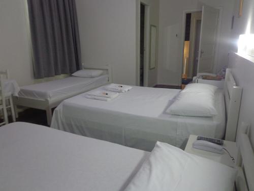 Postel nebo postele na pokoji v ubytování Hotel Pousada XV