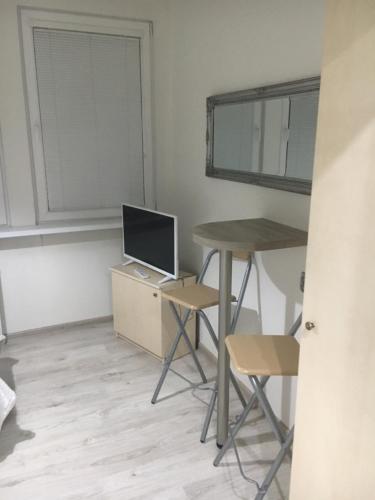 Μια τηλεόραση ή/και κέντρο ψυχαγωγίας στο Apartman Saris