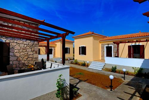 a view of a house with a patio at Mousses Houses in Petra