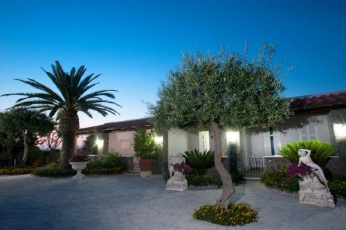 Κήπος έξω από το Residence Le Vigne