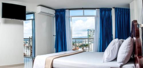 Кровать или кровати в номере Hotel Isla Mayor