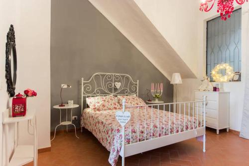 En eller flere senge i et værelse på Il Giardino Del Corso