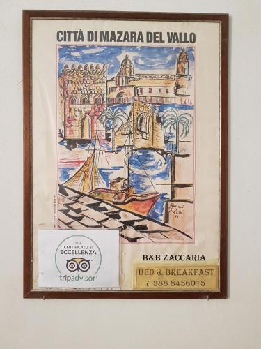 a framed picture of a drawing of a building at La Corte di Zaccaria in Mazara del Vallo