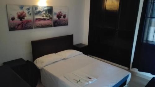 Katil atau katil-katil dalam bilik di Apartamento Ana