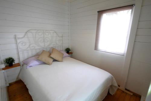 Postel nebo postele na pokoji v ubytování Camping Azahar