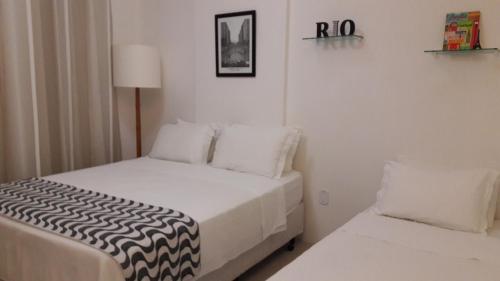 Voodi või voodid majutusasutuse ATLANTICO Apartamentos em Copacabana 2 toas