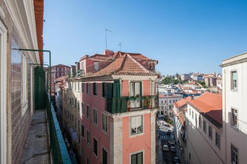 an overhead view of a city with buildings at Duque-Chiado Downtown in Lisbon