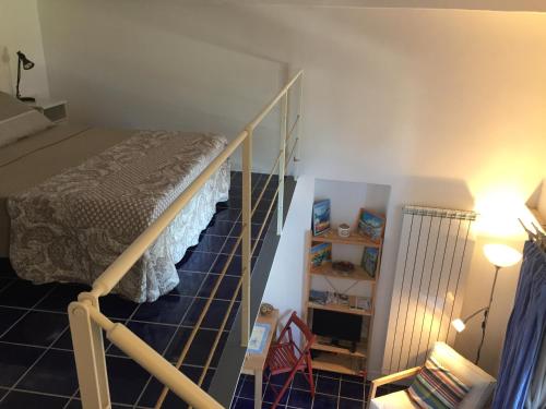 a bedroom with a bunk bed and a staircase at Villa Li Schisani in Sorrento