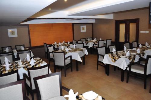 ห้องอาหารหรือที่รับประทานอาหารของ Cochin Seaport Hotel