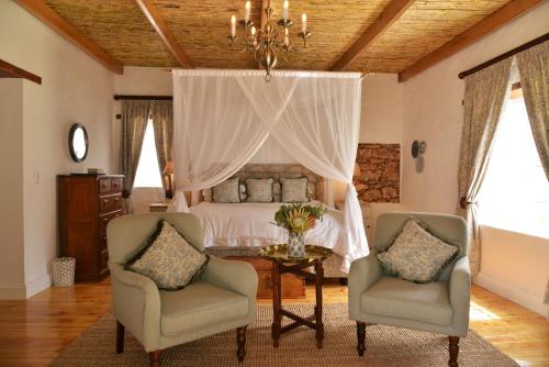 Coin salon dans l'établissement De Hoop Collection Suites