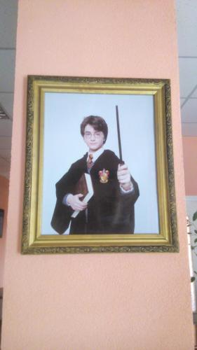 a painting of a boy holding a baseball bat at У Поттера in Ternopilʼ