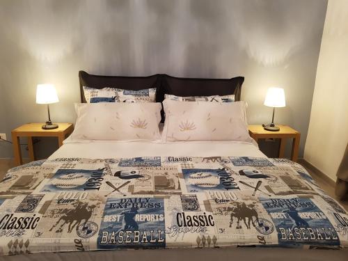 A bed or beds in a room at Suite Luisa Roma