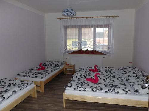 Cama o camas de una habitación en Ubytování u Kratochvílů