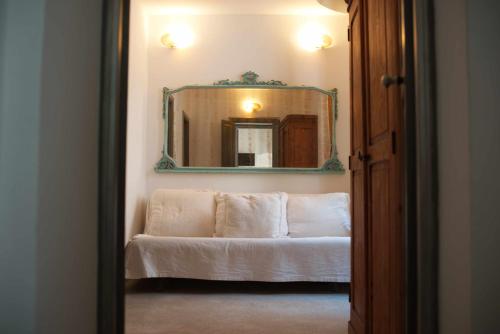 Postel nebo postele na pokoji v ubytování Palazzo Salapolis - Luxury Apartments