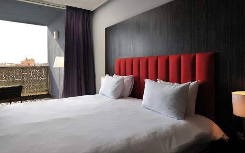 Cama o camas de una habitación en Mercure Nador Rif