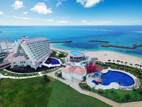 an aerial view of a hotel and the beach at Sheraton Okinawa Sunmarina Resort in Onna