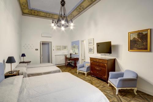 Postel nebo postele na pokoji v ubytování Demetra Rooms