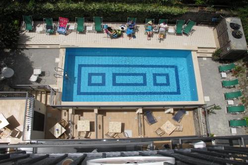 Bazén v ubytování Hotel Club nebo v jeho okolí