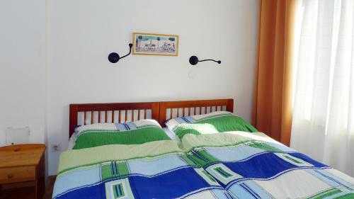 ウィーンにあるWohlmutstraßeのベッドルーム1室(枕2つ付)