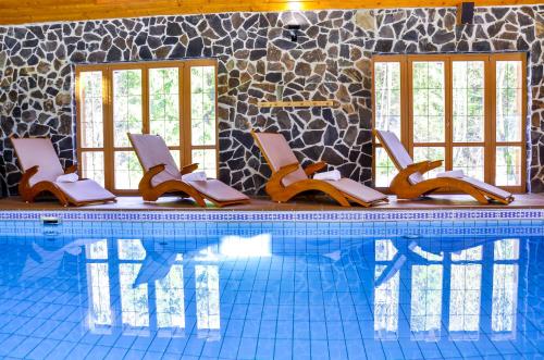 Bazén v ubytování Hotel****Liptovský dvor nebo v jeho okolí
